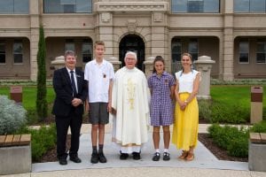 Principal Chris Randell, Dean Peter Bickley, Sion Campus Director Kelly Burgiel with Sion Captains Axl Cox and Matilda Pendergast